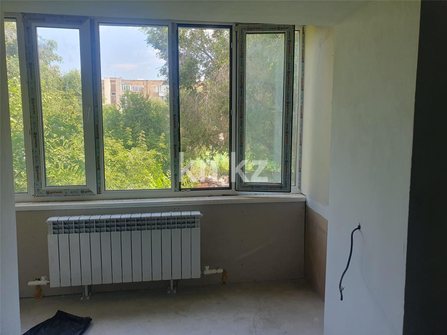 Продажа 1-комнатной квартиры, 44 м², ул. Аманжолова в Караганде - фото 2