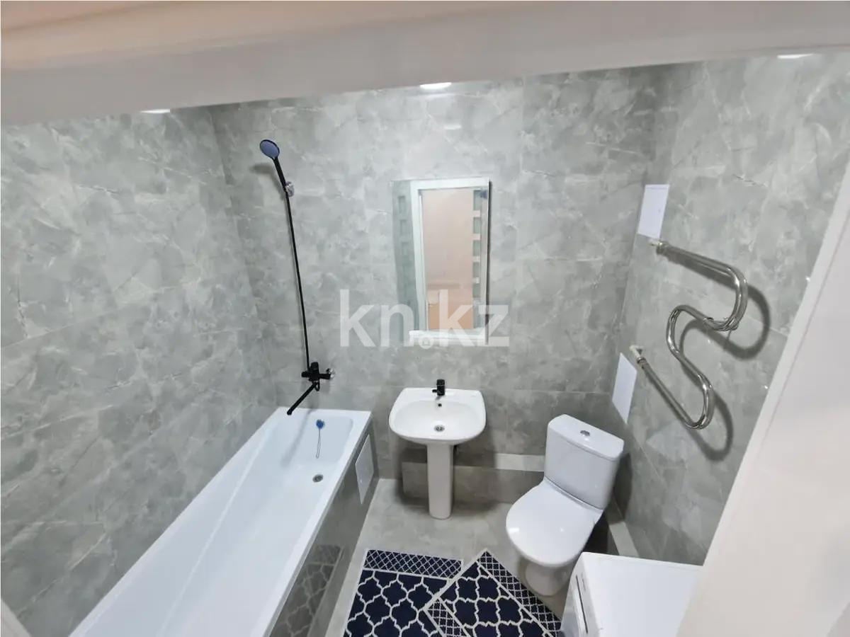 Продажа 1-комнатной квартиры, 38 м², ул. Толе би, дом  46 в Астане - фото 3