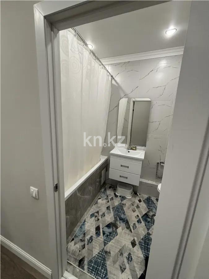 Продажа 2-комнатной квартиры, 64 м², ул. Онгарсыновой, дом  8 в Астане - фото 4