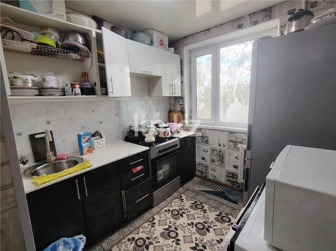 Продажа 4-комнатной квартиры, 61 м², ул. Байсеитовой в Темиртау - фото 9