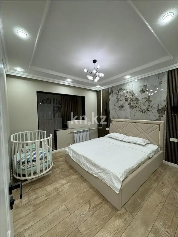 Продажа 2-комнатной квартиры, 58 м², ул. Тургута Озала, дом  94 в Алматы - фото 2