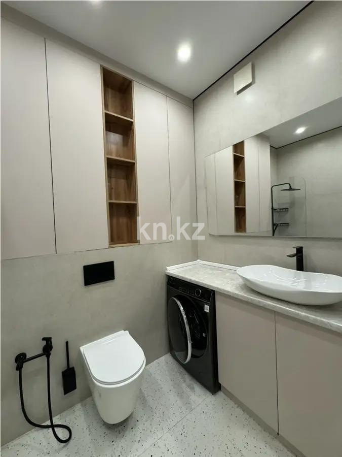 Продажа 2-комнатной квартиры, 56 м², ул. Толе би, дом  16 в Астане - фото 4