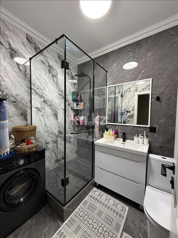 Продажа 2-комнатной квартиры, 52 м², ул. Толе би, дом  285/8 к13 - ул. Утеген батыра в Алматы - фото 12