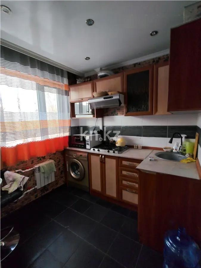 Продажа 1-комнатной квартиры, 33 м², 19 мкр., дом  52 в Караганде - фото 2