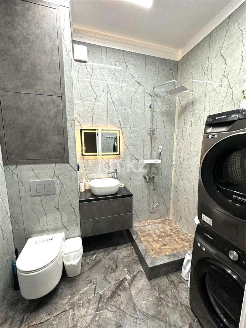 Продажа 3-комнатной квартиры, 97 м², ул. Муканова в Караганде - фото 11