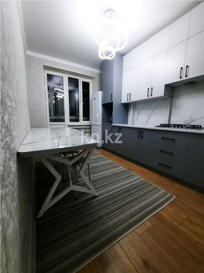 Продажа 2-комнатной квартиры, 56 м², ул. Богенбай батыра, дом  254 в Алматы - фото 3