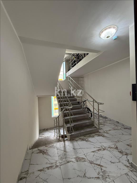 Продажа 2-комнатной квартиры, 52 м², ул. Толе би, дом  285/8 к13 - ул. Утеген батыра в Алматы - фото 19