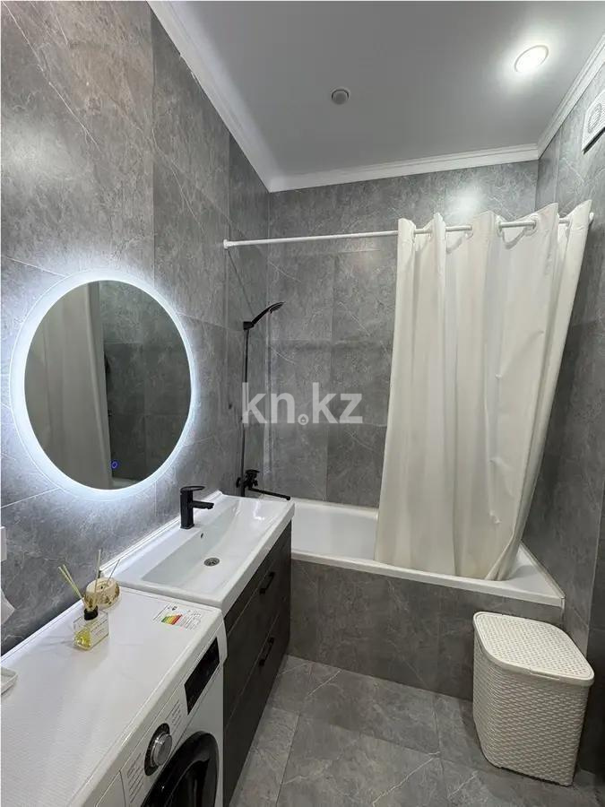 Продажа 2-комнатной квартиры, 61 м², ул. Омарова, дом  2/1 в Астане - фото 4