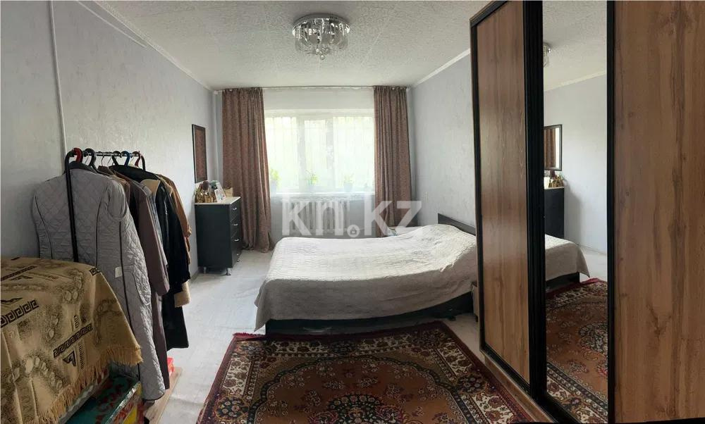 Продажа 2-комнатной квартиры, 56 м², мкр-н 16, дом  25 в Караганде - фото 2