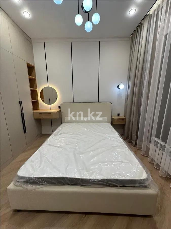 Продажа 2-комнатной квартиры, 52 м², ул. Сыганак, дом  28 в Астане - фото 2