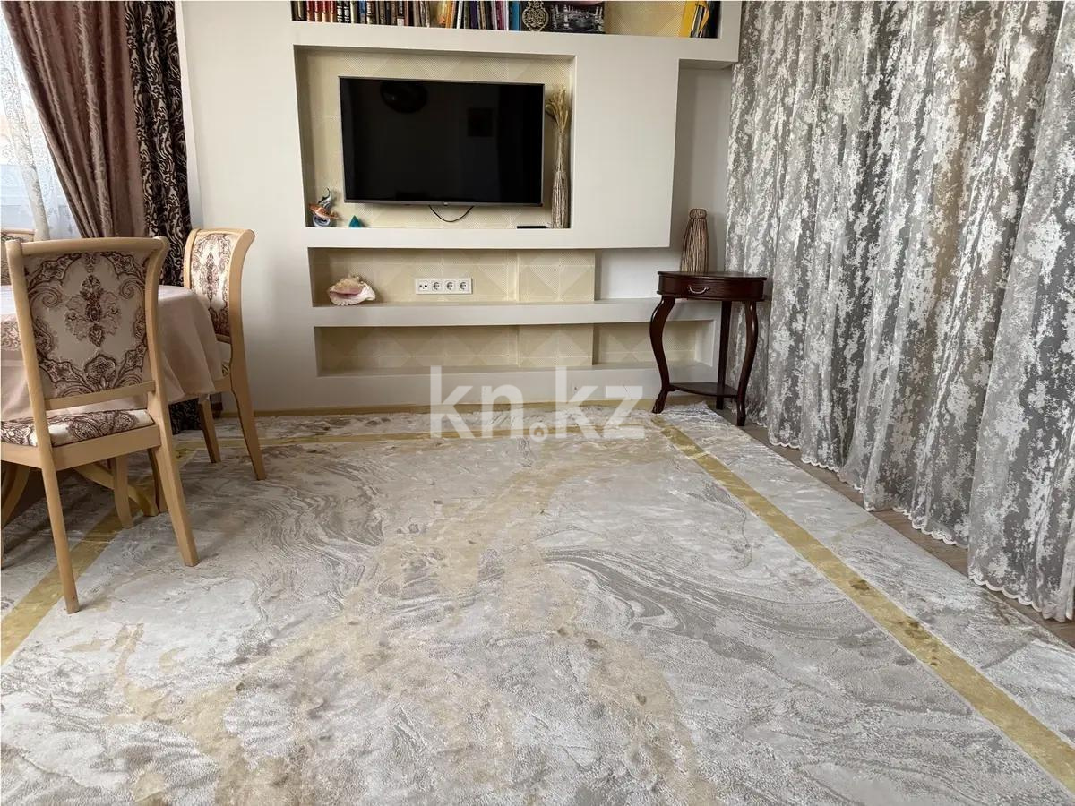 Продажа 2-комнатной квартиры, 69 м², ул. Каппарова, дом  9/11 - Продажа квартир в Алматы фото 1 из 5