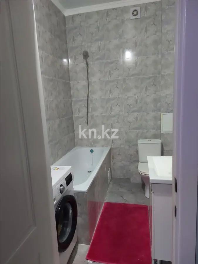 Продажа 2-комнатной квартиры, 52 м², ул. Толе би, дом  12/1 в Астане - фото 3