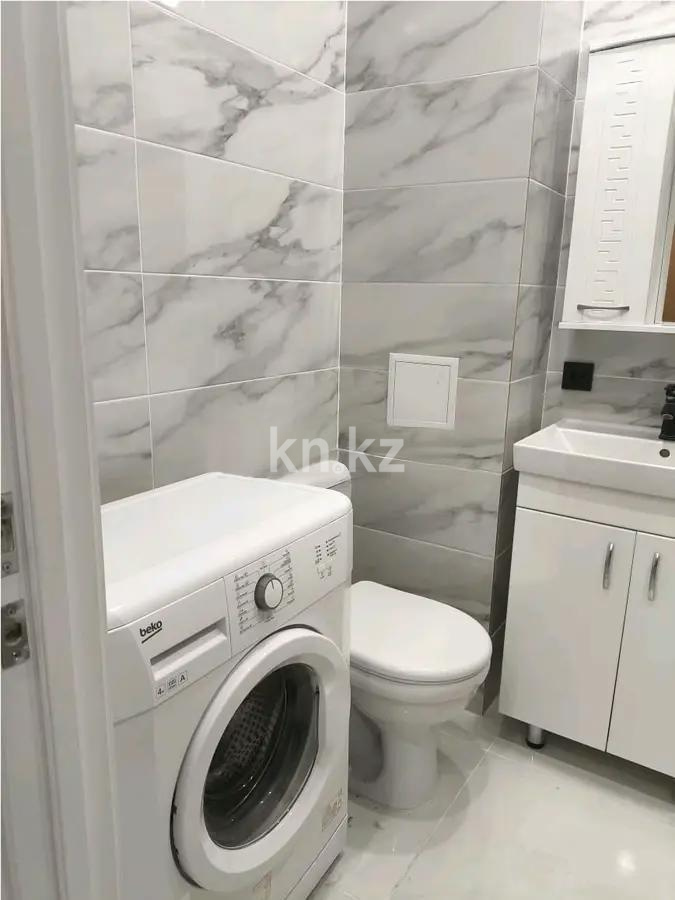 Продажа 1-комнатной квартиры, 33 м², пр. Тауелсыздык, дом  34/9 в Астане - фото 3