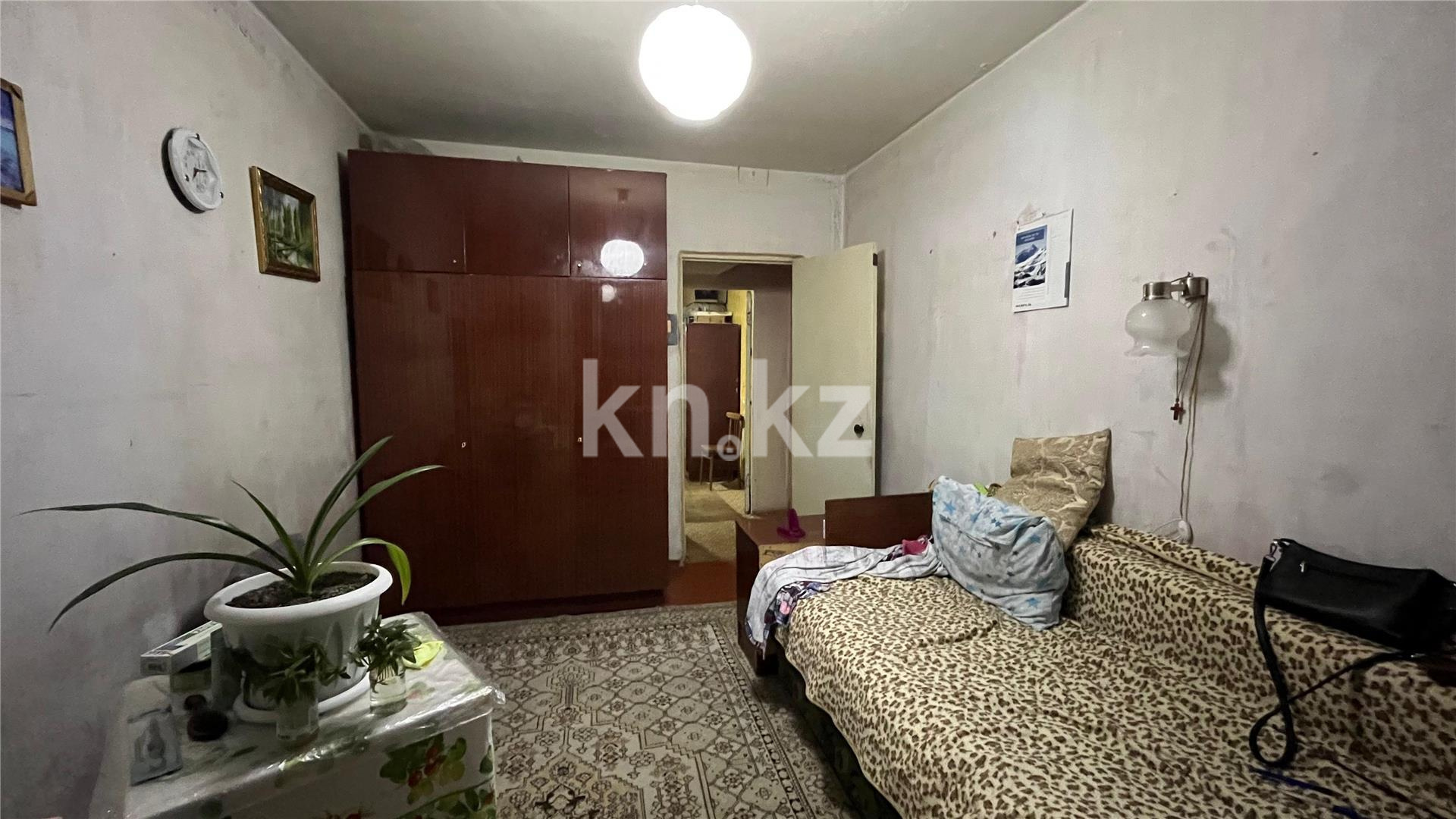 Продажа 4-комнатной квартиры, 77 м², мкр-н 19 в Караганде - фото 4