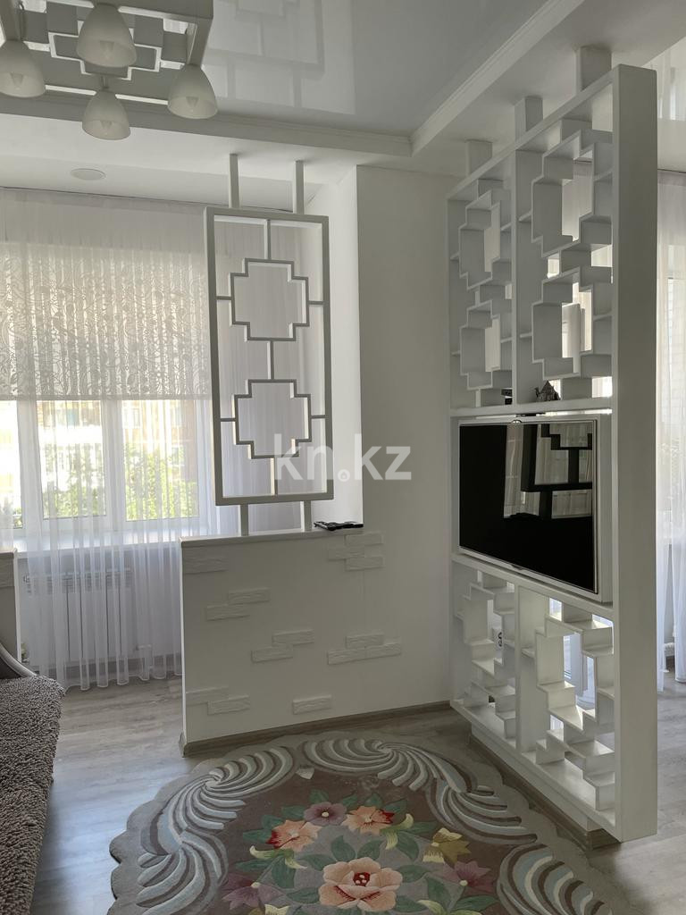 Продажа 2-комнатной квартиры, 56 м², мкр-н Гульдер-1, дом  3/4 - Продажа квартир в Караганде фото 2 из 19