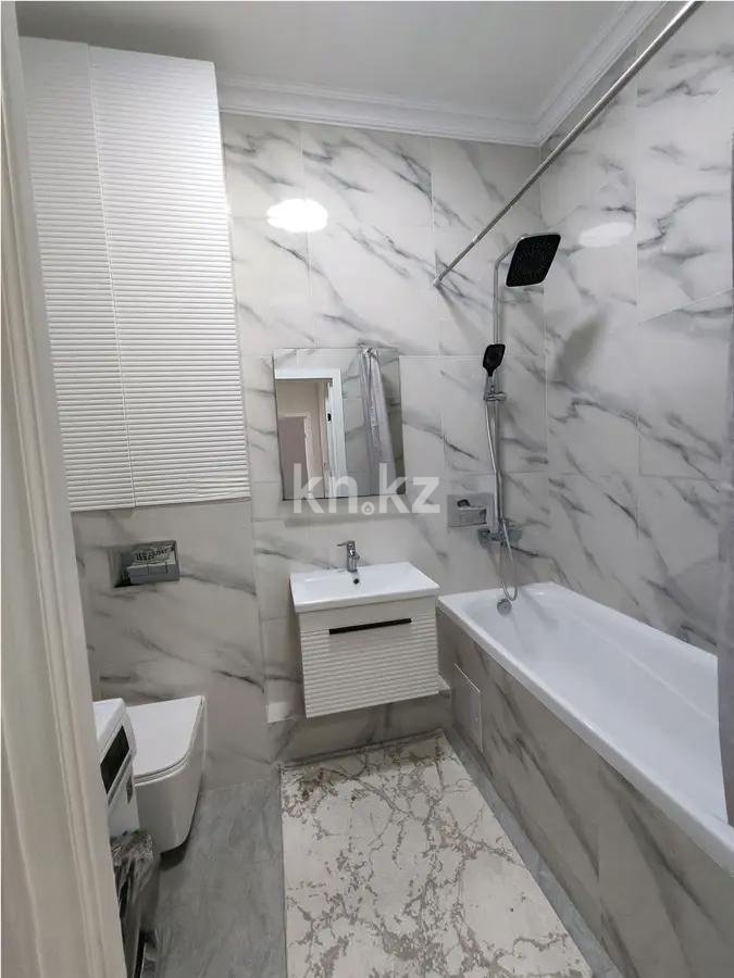 Продажа 2-комнатной квартиры, 60 м², ул. Толе би, дом  14 в Астане - фото 4