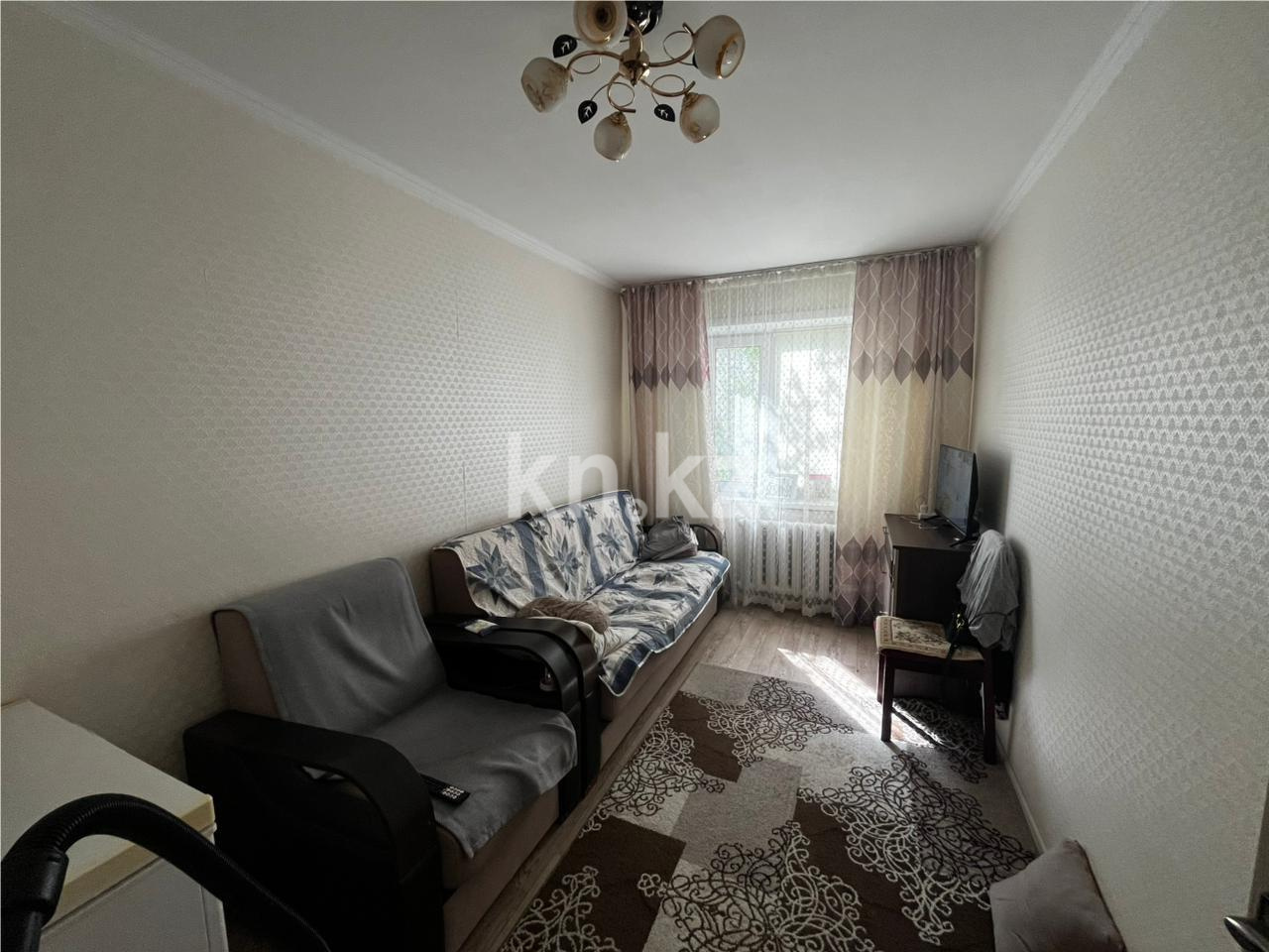 Продажа 3-комнатной квартиры, 63 м², мкр-н 15, дом  16 в Караганде - фото 2