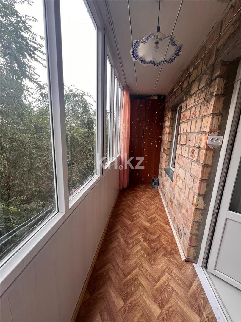 Продажа 2-комнатной квартиры, 50 м², 11 кв-л, дом  15 - Продажа жилой и коммерческой недвижимости в Казахстане фото 11 из 12