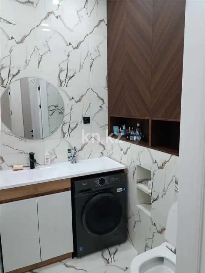 Продажа 1-комнатной квартиры, 43 м², пр. Аль-Фараби, дом  7 в Астане - фото 3