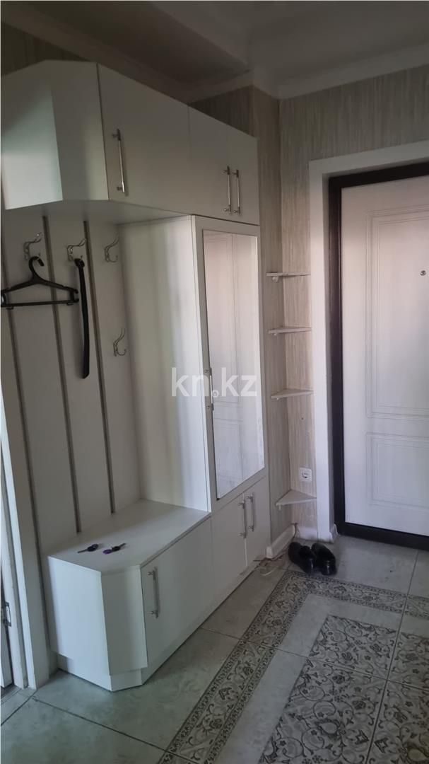 Продажа 2-комнатной квартиры, 57 м², ул. Сыганак в Астане - фото 4