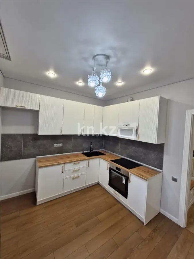 Продажа 1-комнатной квартиры, 42 м², ул. Сатпаева, дом  90а в Алматы - фото 2