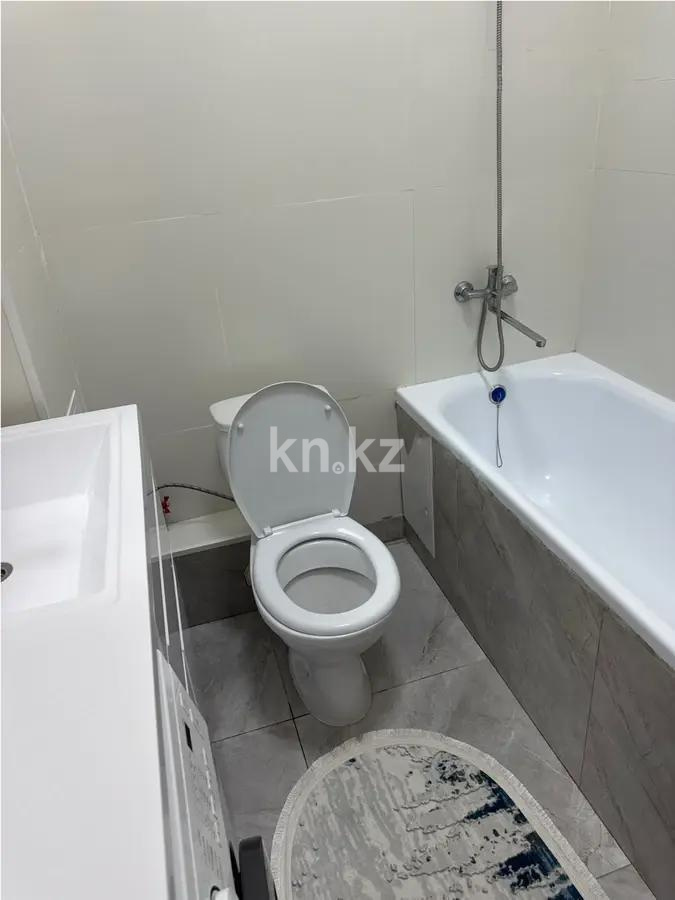 Продажа 2-комнатной квартиры, 52 м², пр. Туран, дом  40/1 в Астане - фото 4