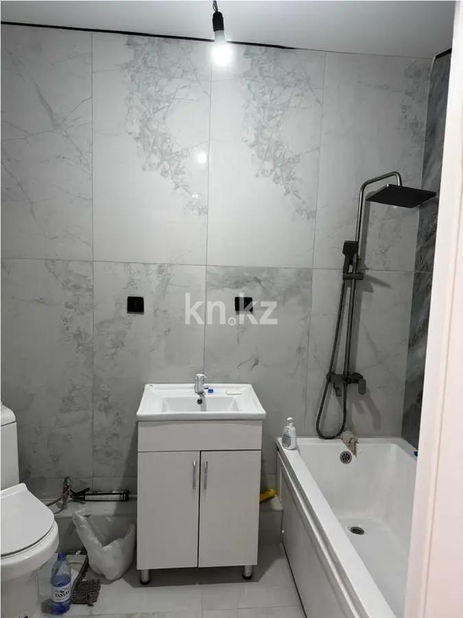 Продажа 2-комнатной квартиры, 56 м², ул. Омарова, дом  1 в Алматы - фото 5