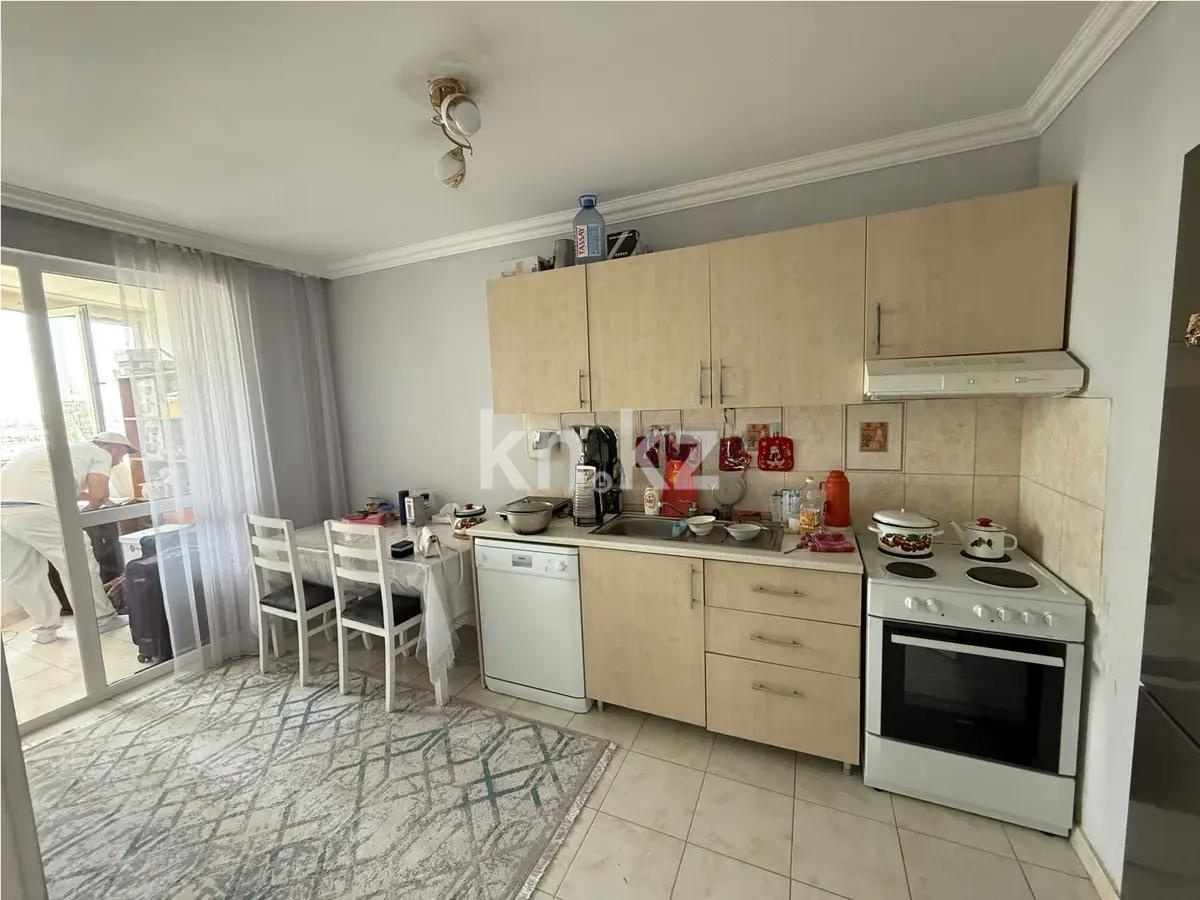 Продажа 1-комнатной квартиры, 45 м², мкр-н Аккент, дом  33 в Алматы - фото 2