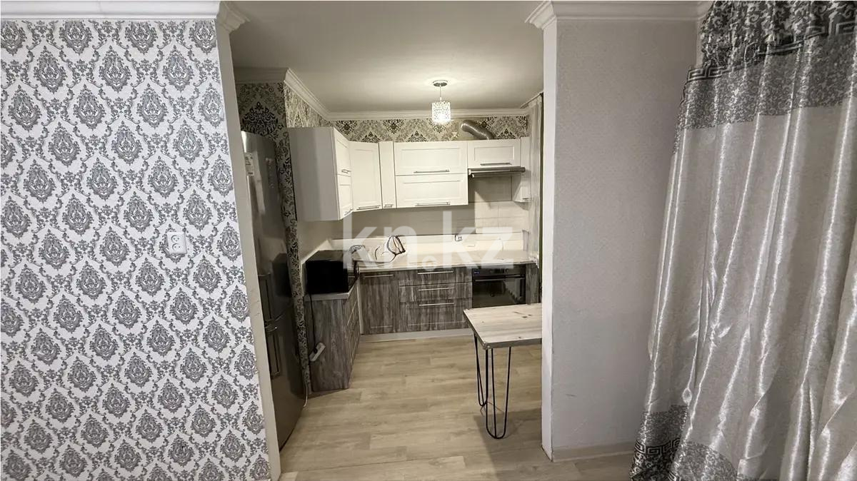 Продажа 2-комнатной квартиры, 48 м², мкр-н 23, дом  39а в Караганде - фото 2