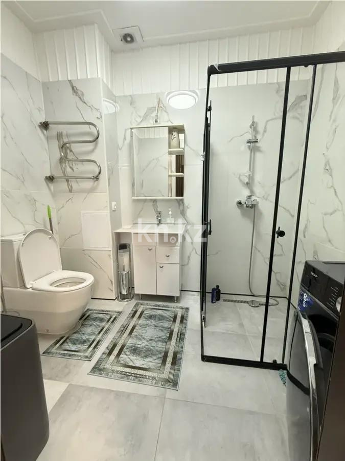 Продажа 2-комнатной квартиры, 54.3 м², ул. Е-15, дом  9/1 в Астане - фото 4