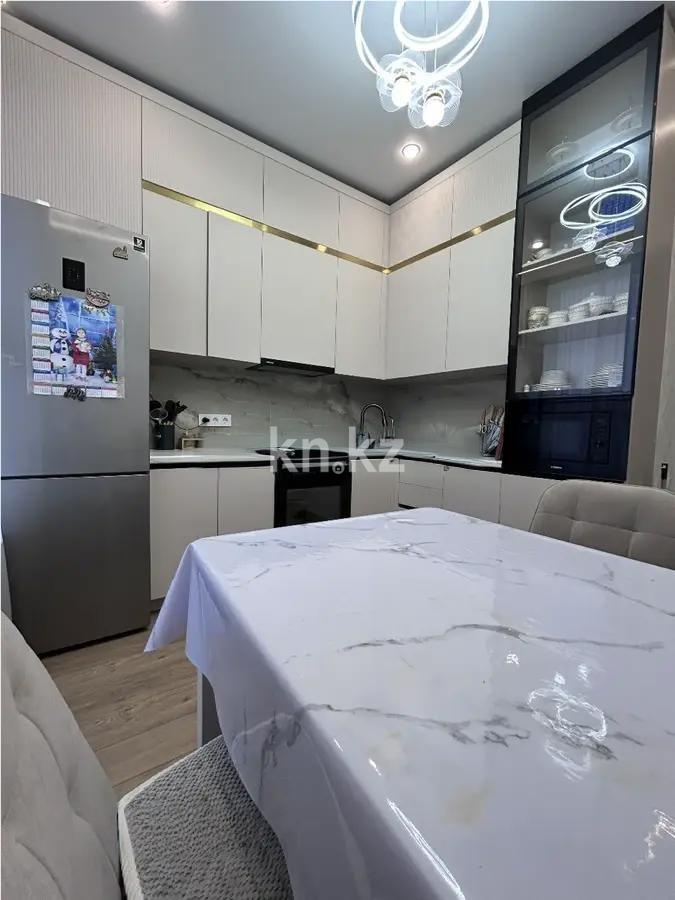 Продажа 2-комнатной квартиры, 62 м², ул. Сыганак, дом  24 в Астане - фото 3