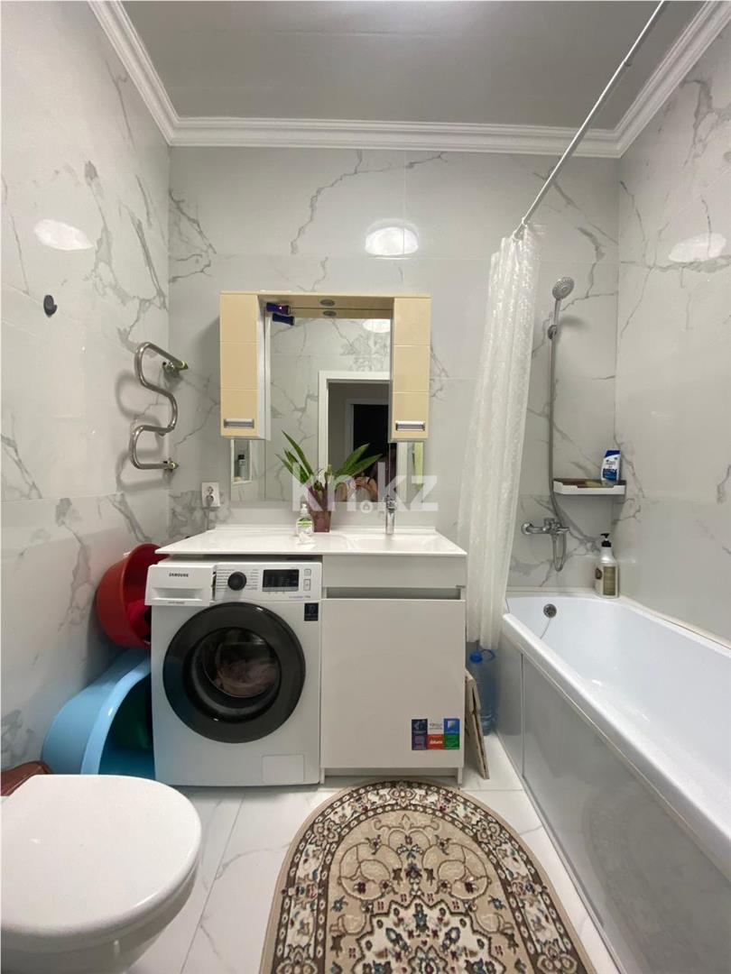 Продажа 2-комнатной квартиры, 57 м², ул. Орынбор в Астане - фото 7