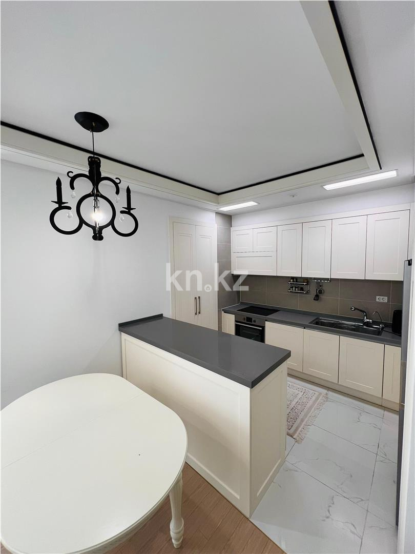 Продажа 2-комнатной квартиры, 75.5 м², ул. Калдаякова в Астане - фото 4