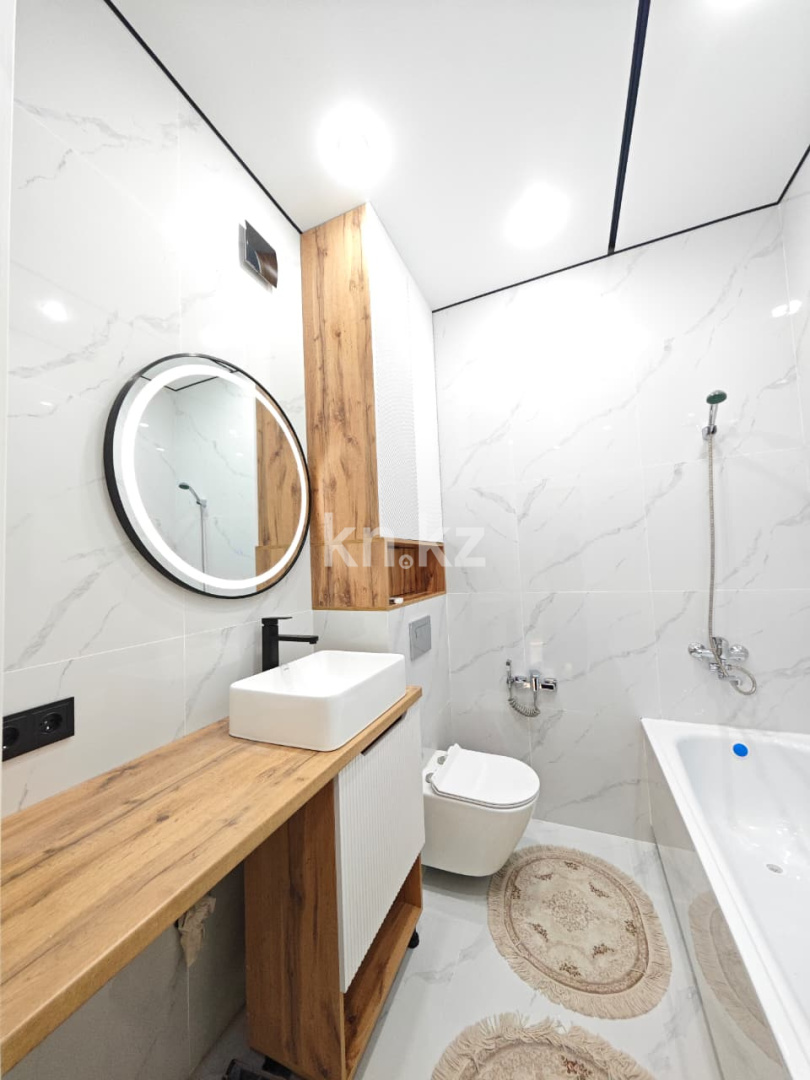 Продажа 2-комнатной квартиры, 59 м², ул. Университетская, дом  18 - Продажа  двухкомнатных квартир в Караганде фото 12 из 16