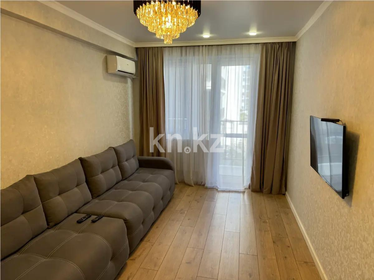 Продажа 2-комнатной квартиры, 57 м², ул. Толе би, дом  285/8 - Продажа квартир в Алматы фото 1 из 6