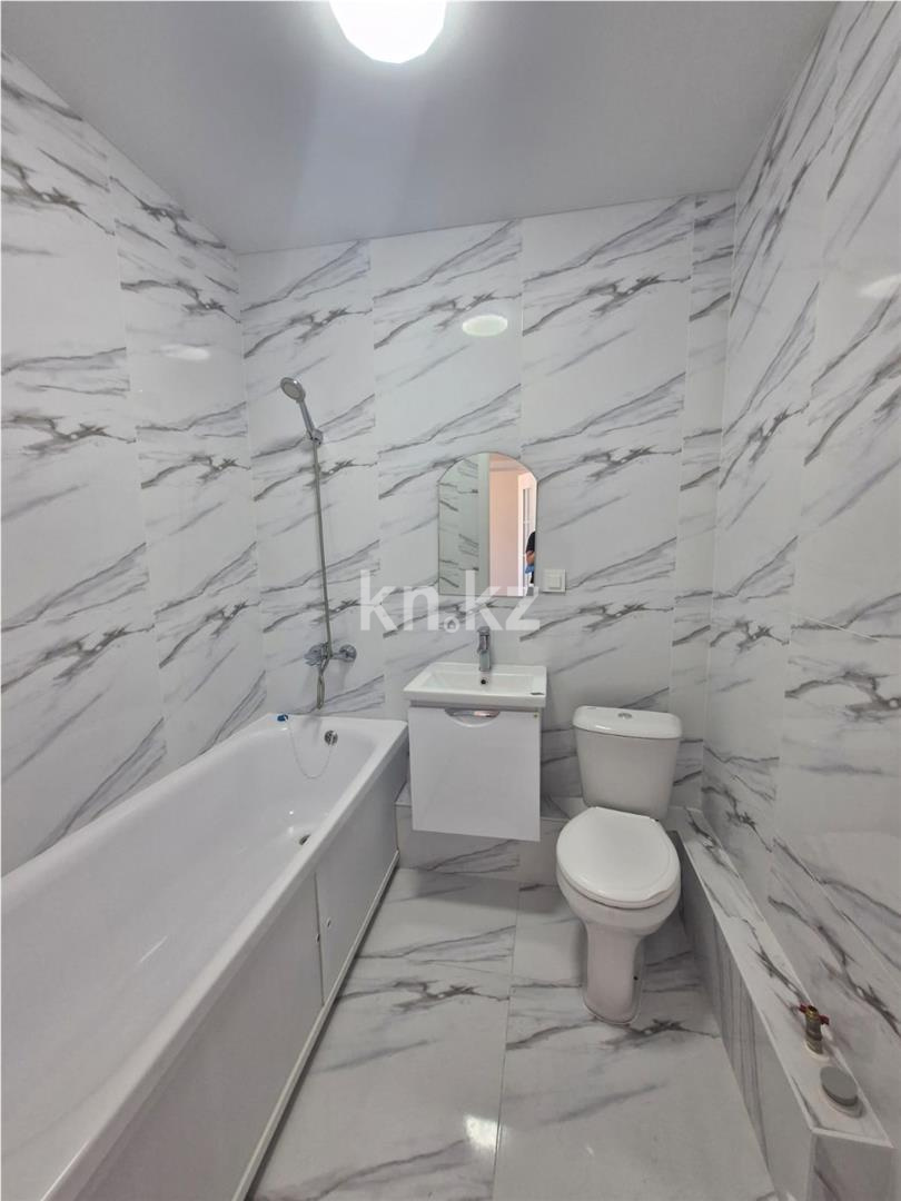 Продажа 1-комнатной квартиры, 34 м², ул. Толе би в Астане - фото 4