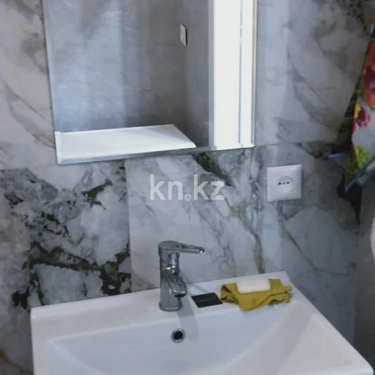 Продажа 2-комнатной квартиры, 42 м², ул. Толе би, дом  40 - ул. Баглановой в Астане - фото 2