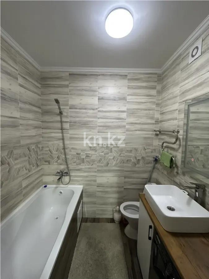 Продажа 2-комнатной квартиры, 50 м², ул. Сыганак, дом  6 в Астане - фото 4