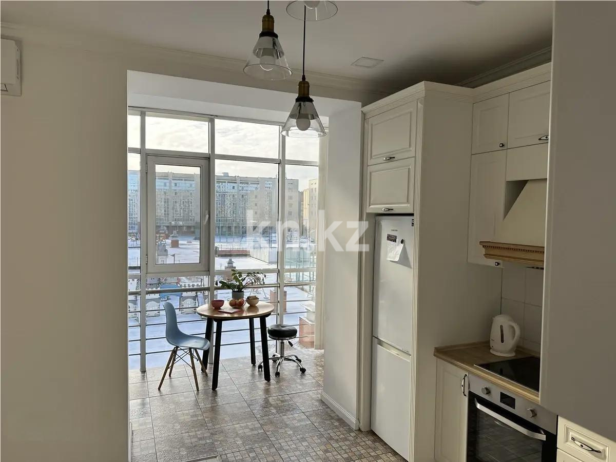 Продажа 1-комнатной квартиры, 50 м², ул. Толе би, дом  44 в Астане - фото 2