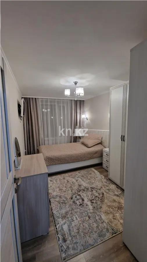 Продажа 2-комнатной квартиры, 49 м², мкр-н 19, дом  45а в Караганде - фото 2