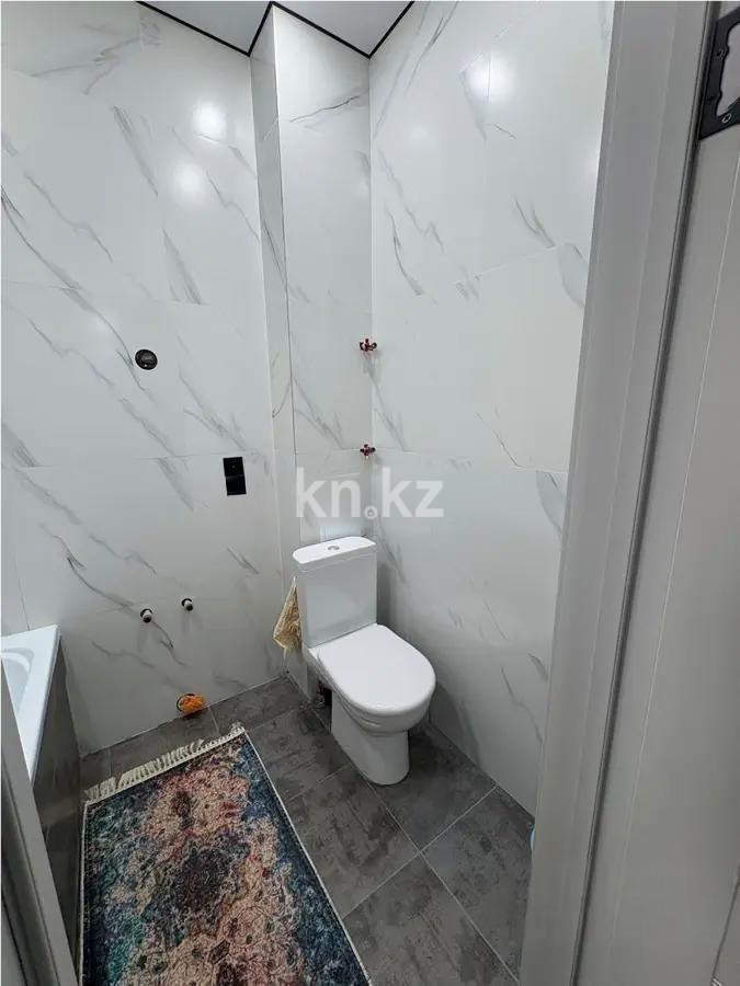 Продажа 1-комнатной квартиры, 37 м², ул. Калдаякова, дом  28 в Астане - фото 4