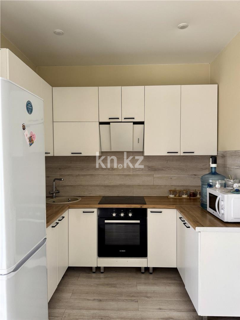Продажа 2-комнатной квартиры, 63 м², ул. Муканова в Караганде - фото 2