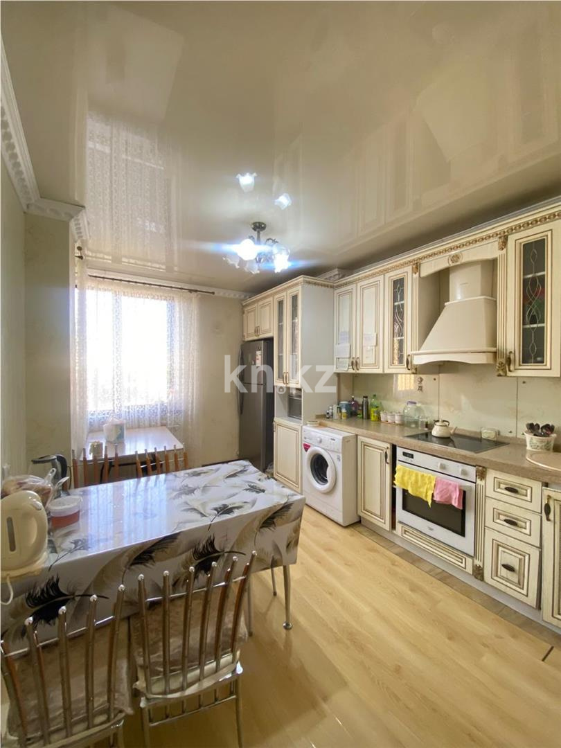 Продажа 3-комнатной квартиры, 99 м², ул. Достык в Астане - фото 10