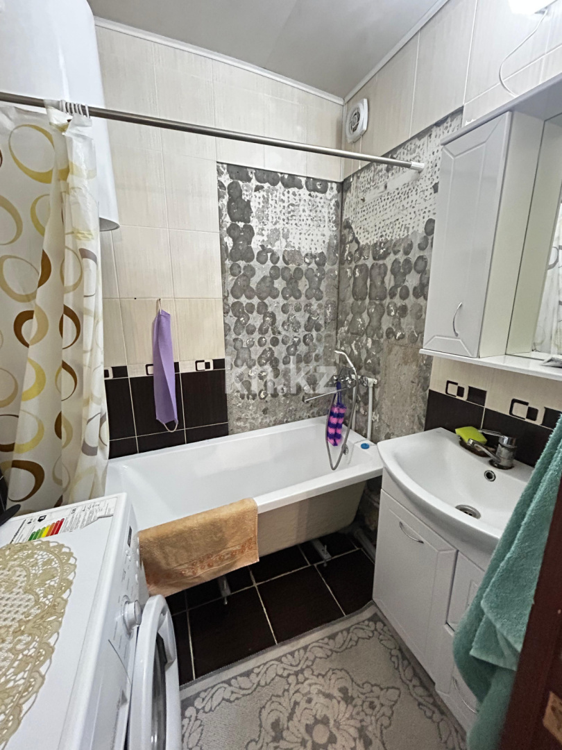 Продажа 2-комнатной квартиры, 57 м², мкр-н Гульдер-1, дом  2 в Караганде - фото 7