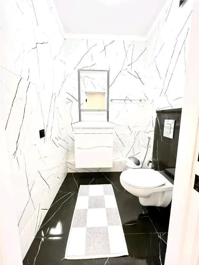 Продажа 3-комнатной квартиры, 95 м², пр. Кошкарбаева, дом  48 в Астане - фото 5