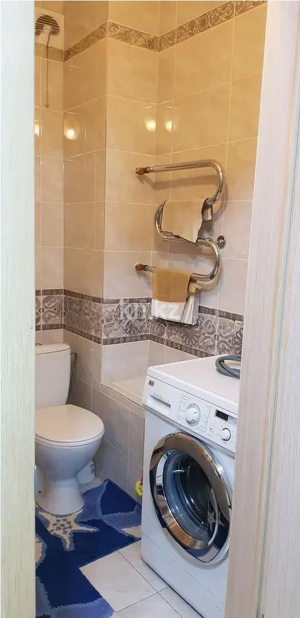 Продажа 2-комнатной квартиры, 52 м², ул. Е-251, дом  4/1 в Астане - фото 4