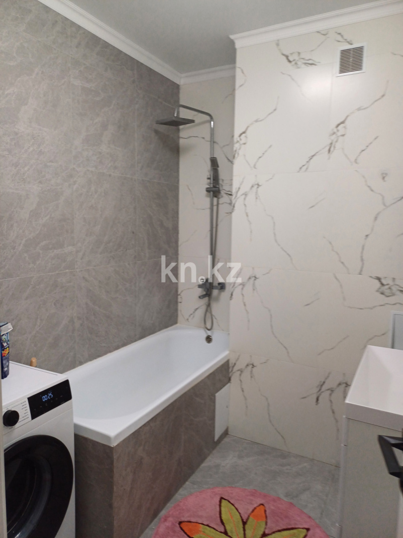 Продажа 2-комнатной квартиры, 61 м², пр. Мангилик Ел, дом  62/4 - ул. Онгарсыновой в Астане - фото 9