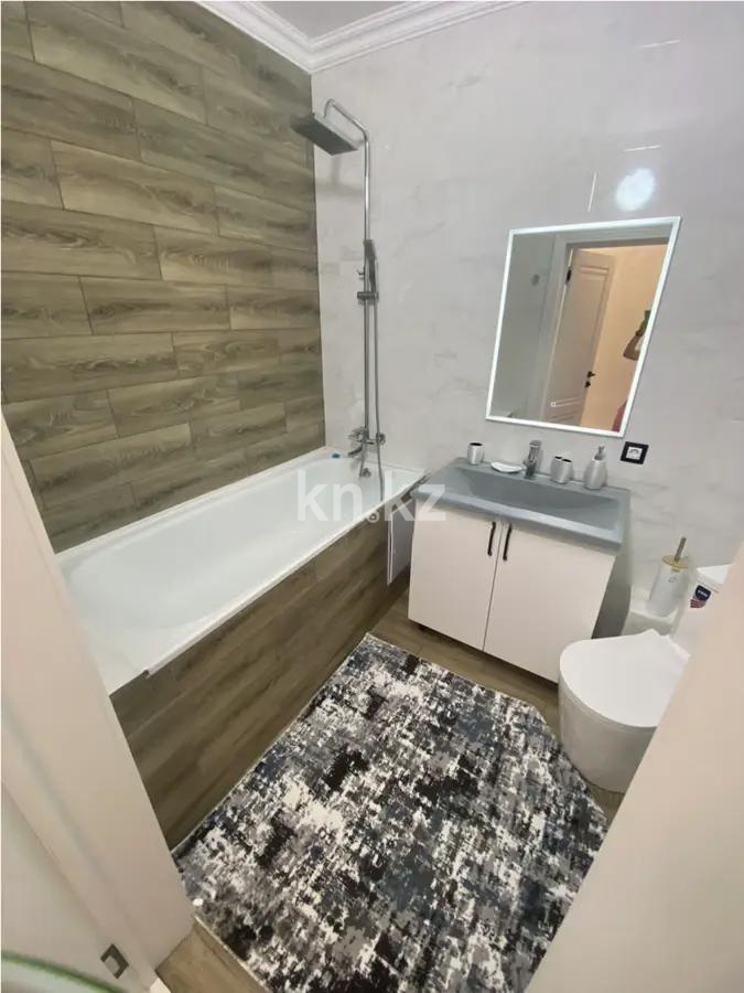 Продажа 2-комнатной квартиры, 82 м², ул. Сыганак, дом  33 в Астане - фото 4