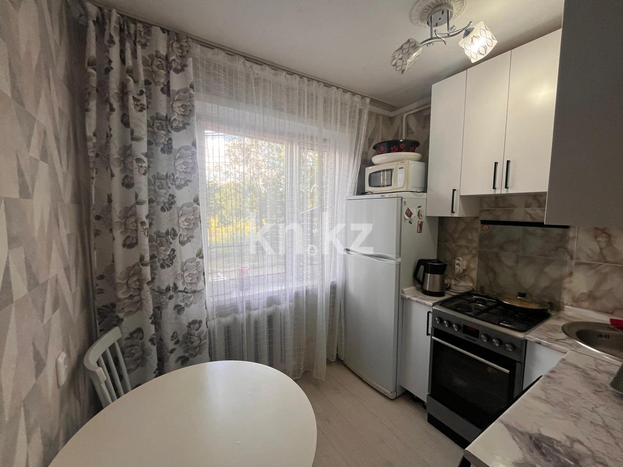 Продажа 2-комнатной квартиры, 44 м², мкр-н 17, дом  39 в Караганде - фото 5