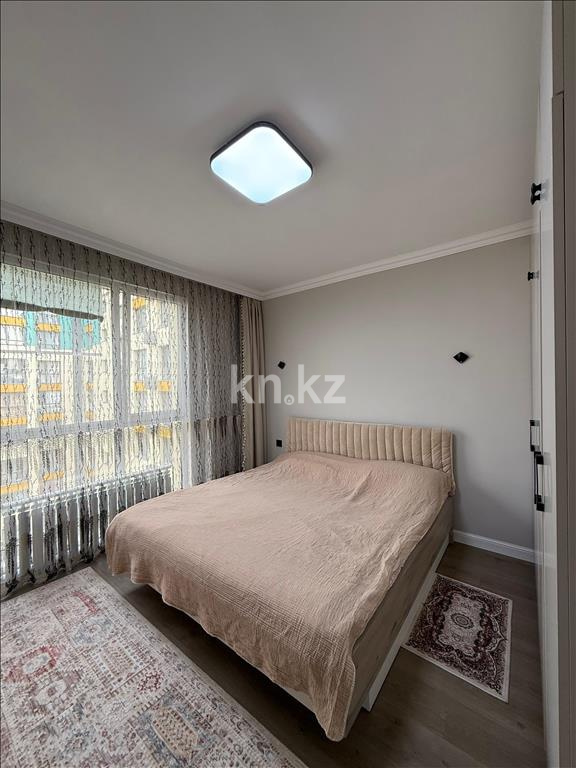 Продажа 2-комнатной квартиры, 52 м², ул. Толе би, дом  285/8 к13 - ул. Утеген батыра в Алматы - фото 26